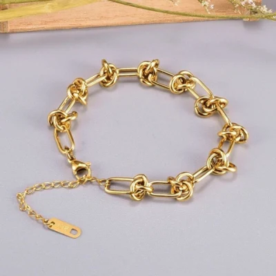 Pulsera de eslabones de cadena cubana chapada en oro de acero inoxidable Pulsera anudada de cadena